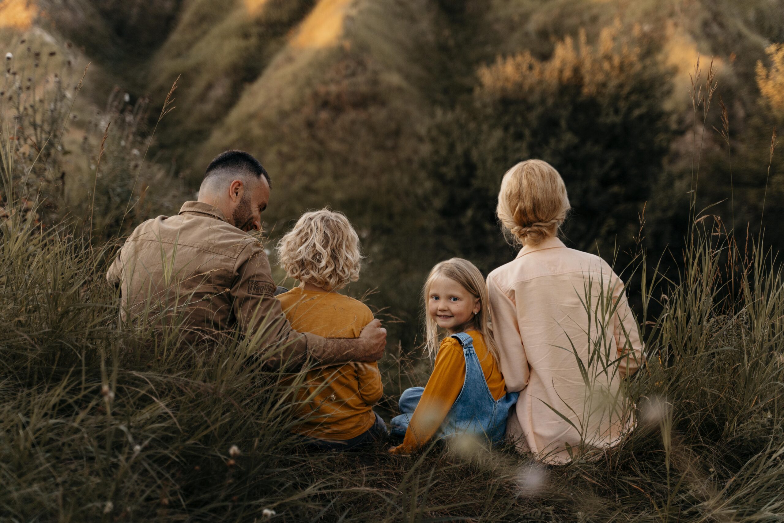 full-shot-parents-kids-nature